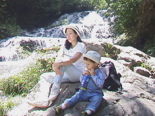 By the waterfall with Mama